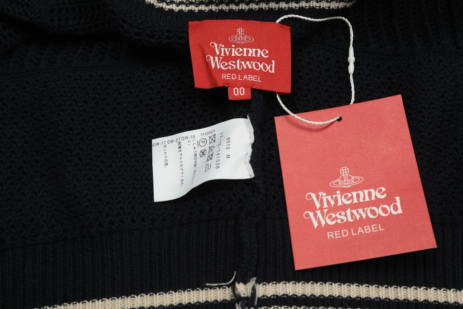 VIVI119# vivienne west wood West Queen Vivian Saturn New Retro "Unisex" Hollow Design Knitted Sweater Wool Round Neck 2024 Spring Latest Style Size: S -M- L Color: Apricot Royal Blue